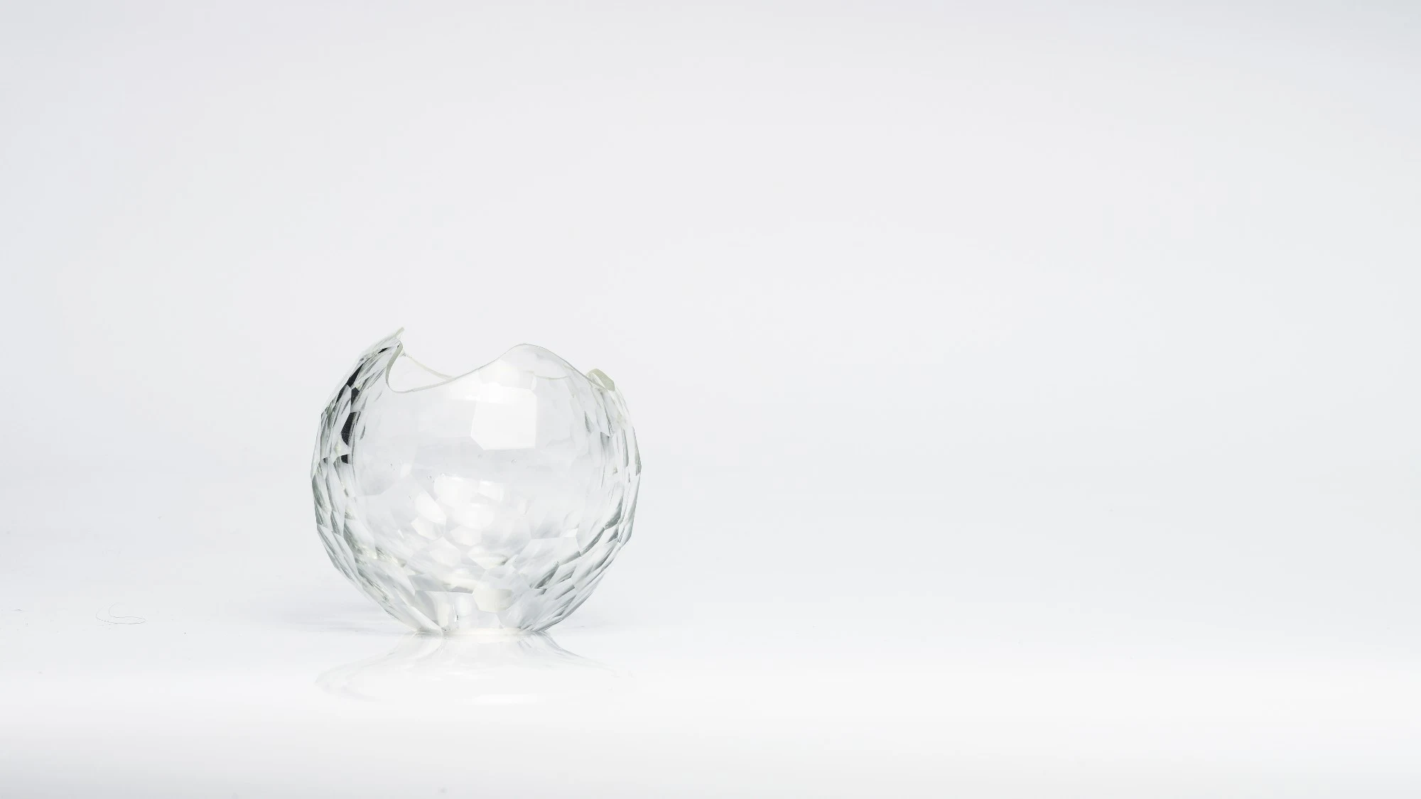 The same open form, small in a wide white space